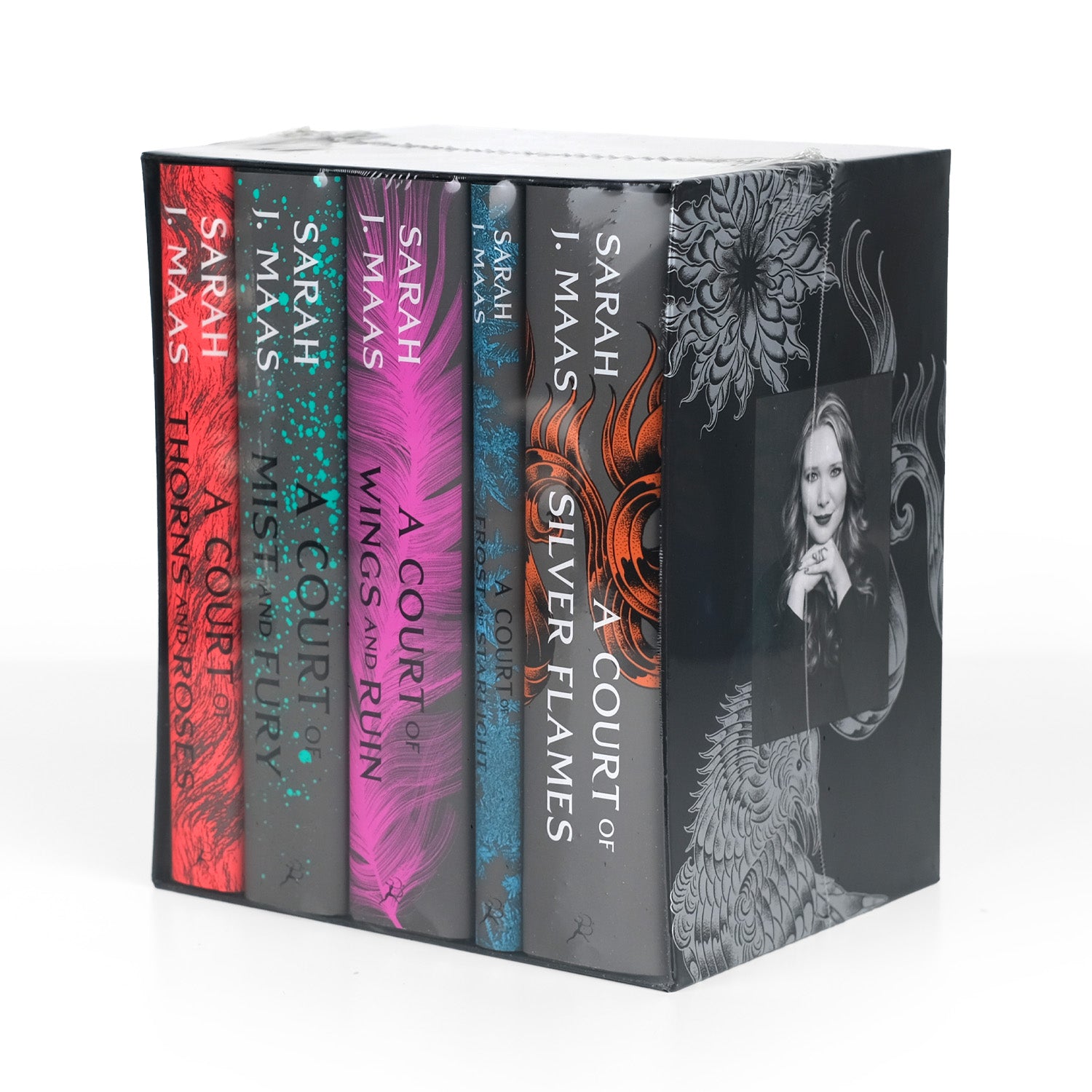 Angled view of A Court of Thorns and Roses by Sarah J Maas brand new shrink wrapped in the publisher box.
