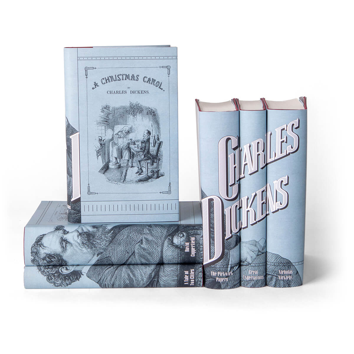 Our Charles Dickens set includes 6 masterpieces, including David Copperfield and Great Expectations. Each book is an heirloom quality hardcover edition published by Everyman's Library. We have wrapped the set in an original jacket design featuring a portrait of Dickens, classic 19th century typography, and a unique blue that references the original first edition covers of Dickens' serial publications.