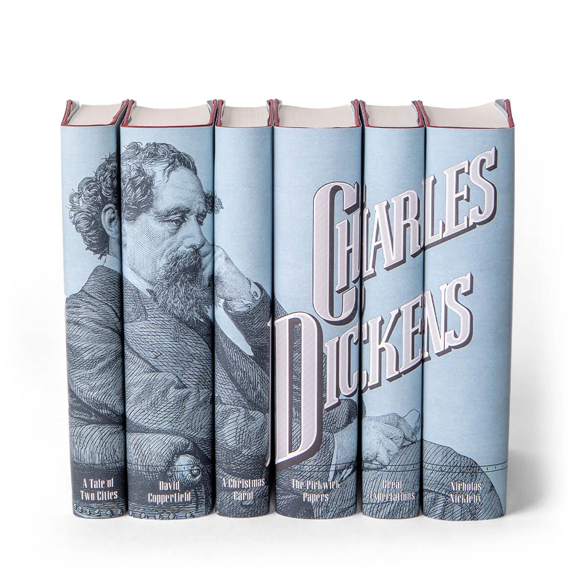 Our Charles Dickens set includes 6 masterpieces, including David Copperfield and Great Expectations. Each book is an heirloom quality hardcover edition published by Everyman's Library. We have wrapped the set in an original jacket design featuring a portrait of Dickens, classic 19th century typography, and a unique blue that references the original first edition covers of Dickens' serial publications.