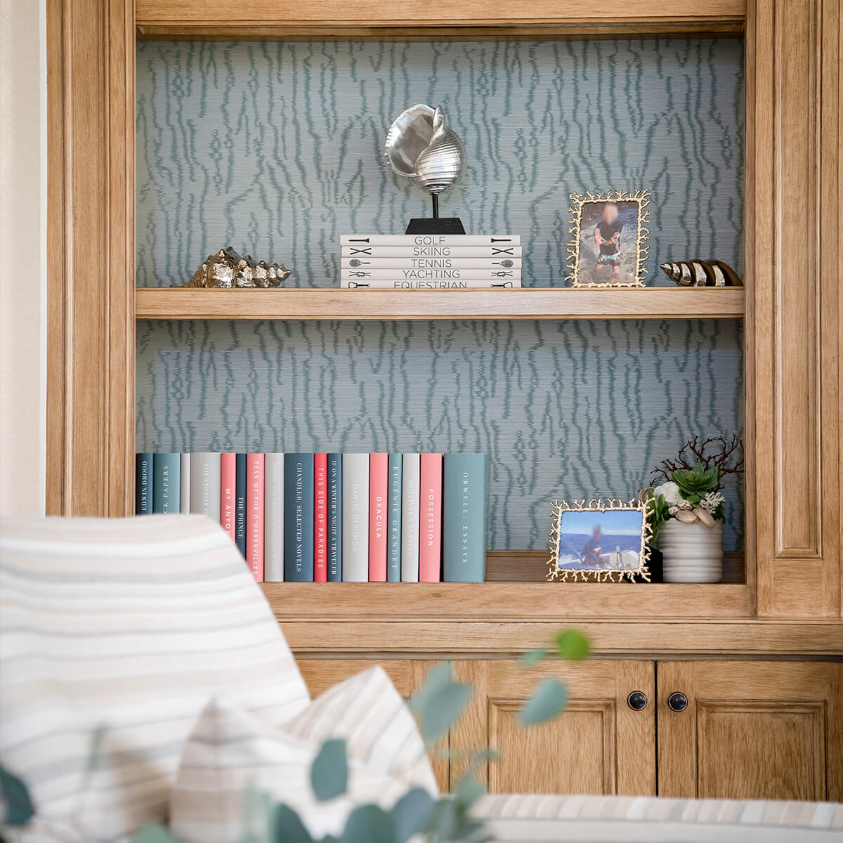 Some of our beachside projects are shown here, but the possibilities are endless. We have frequently taken a minimalistic approach to beach house book collections by crafting a series of pristine white book jackets
