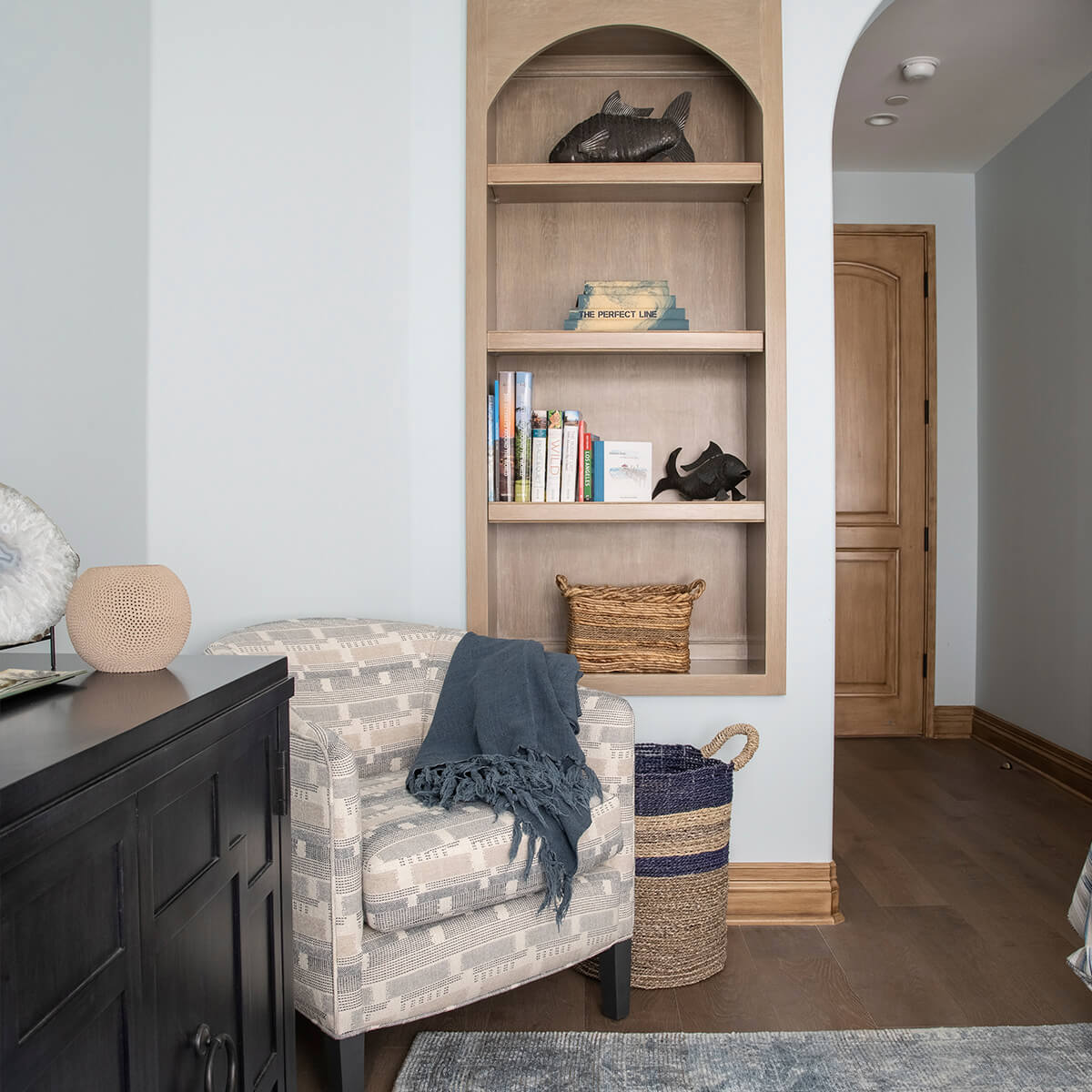 Some of our beachside projects are shown here, but the possibilities are endless. We have frequently taken a minimalistic approach to beach house book collections by crafting a series of pristine white book jackets