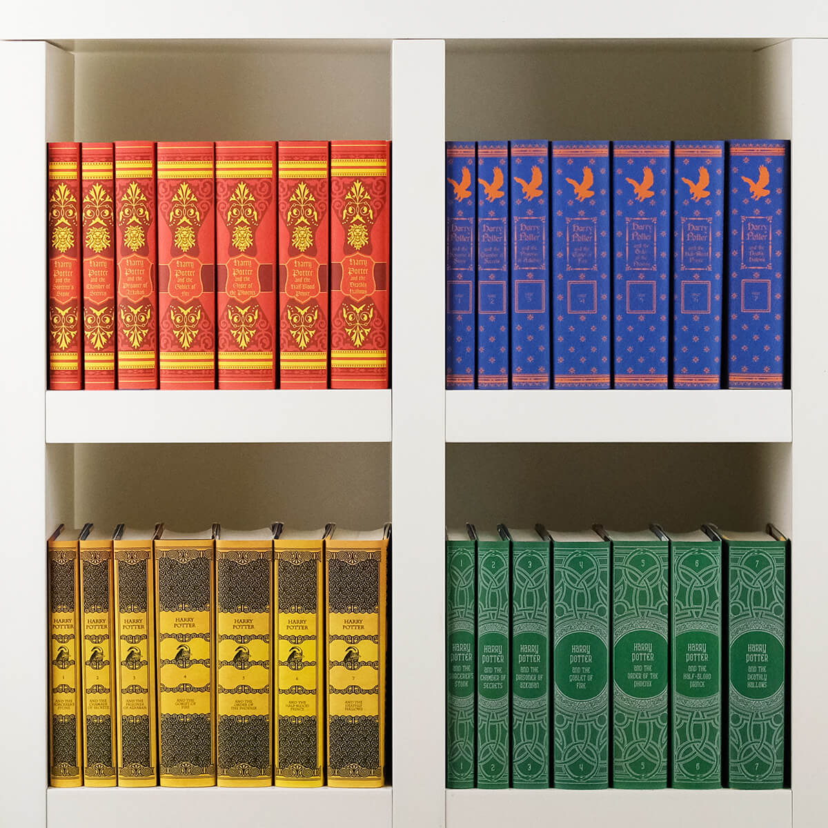 Gryffindor, Ravenclaw, Hufflepuff, and Slytherin custom collectible Harry Potter House sets from Juniper Custom
