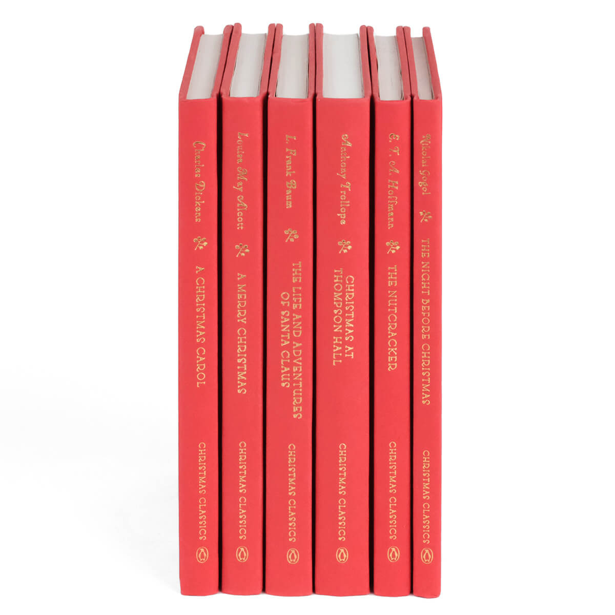 This festive set of novels is the perfect way to celebrate your favorite year-end traditions. Book Set, gift, trade, Christmas shopping. Red Unjacketed books in the set.