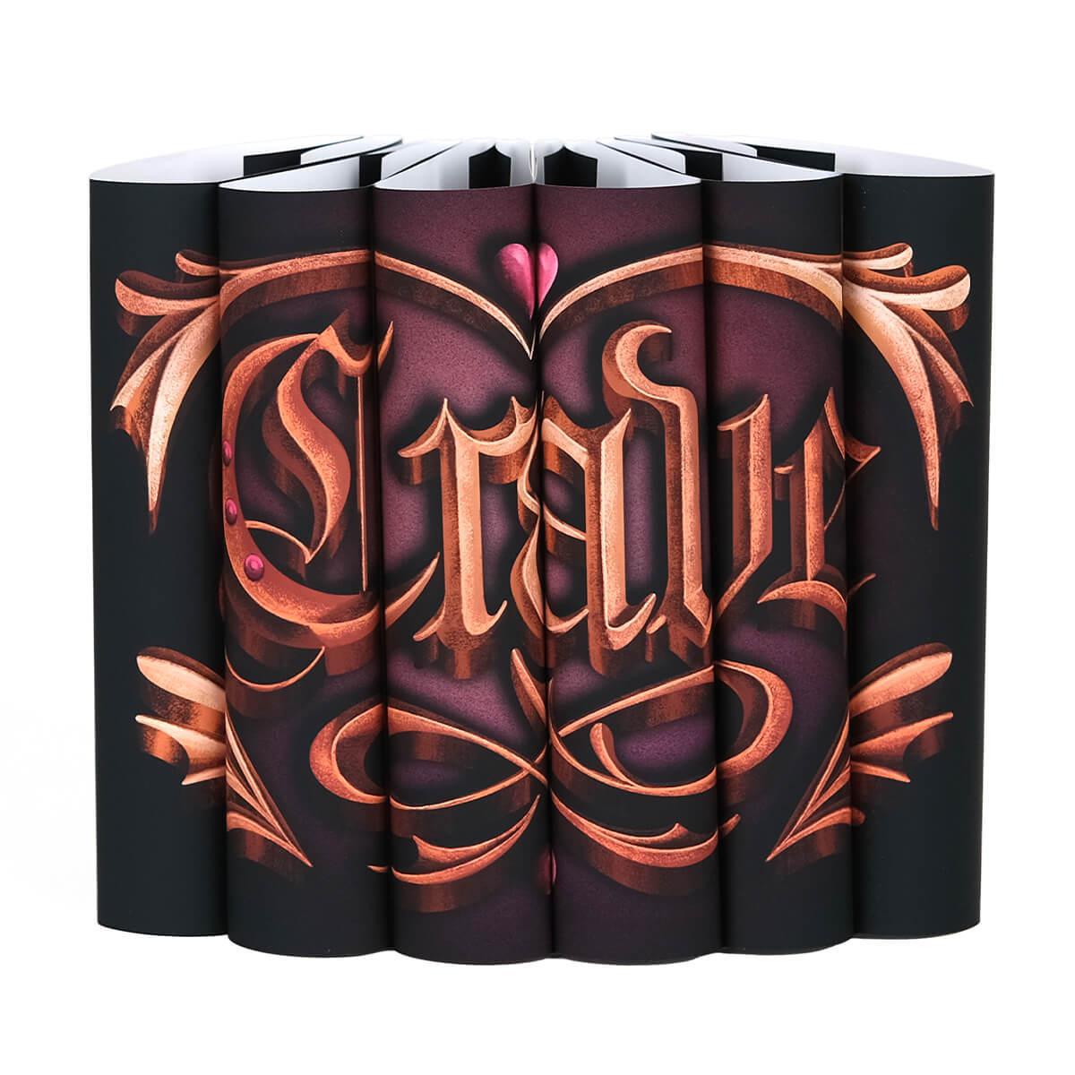 Dust Jackets only bronze ornamental gothic illustration of the word "Crave". Illustration set against a pink to black gradients surrounded by embossed style ornaments and a pink heart centered across the spines.