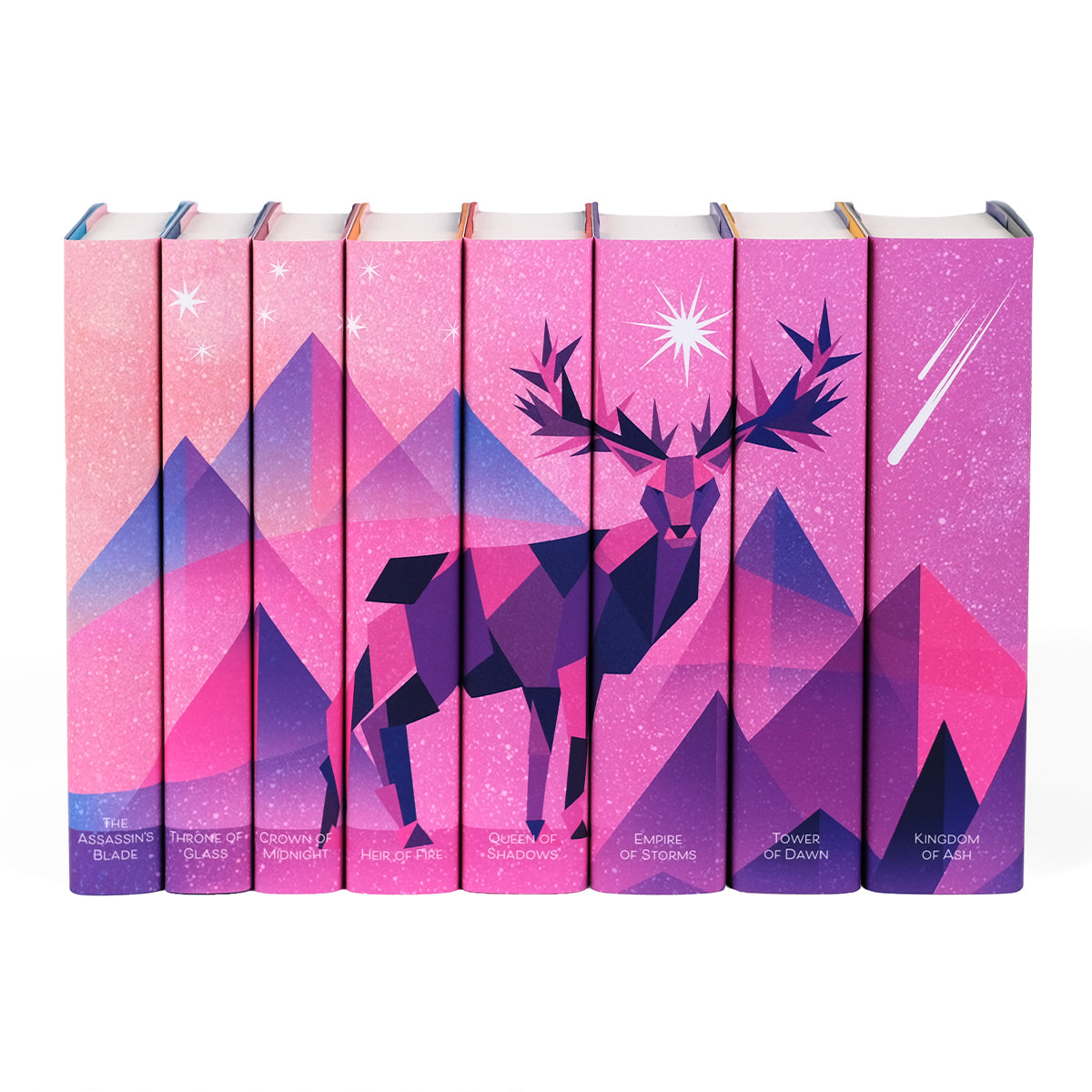 Dust jackets for Throne of Glass Series feature a illustrated stag in shades of pink and purple set against a pink and purple background. Mountains sit behind the stag mixed with a white starry background.