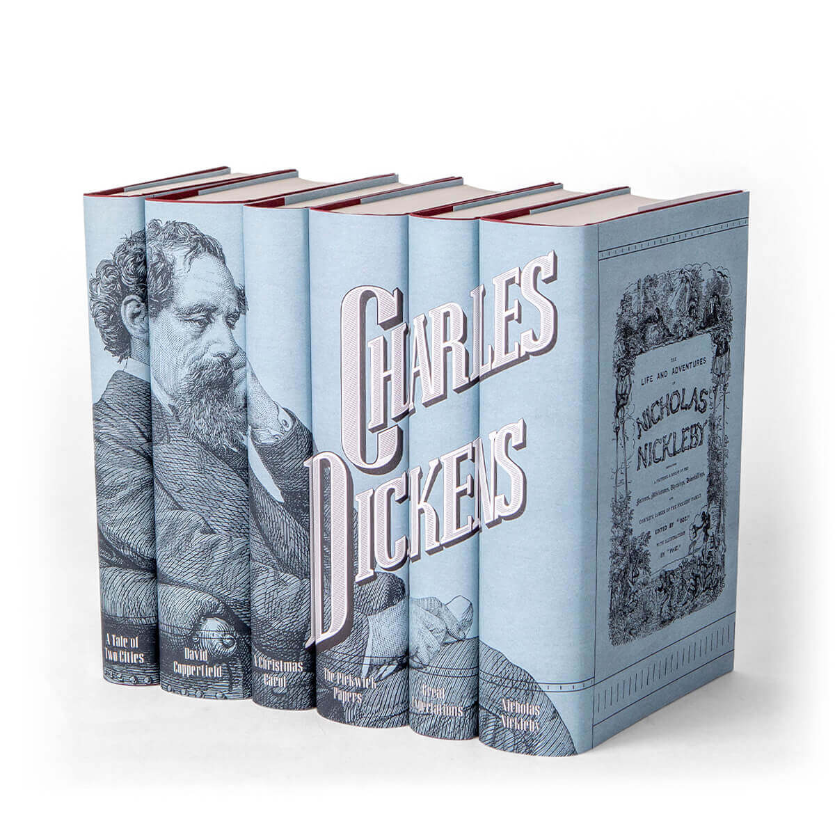 Our Charles Dickens set includes 6 masterpieces, including David Copperfield and Great Expectations. Each book is an heirloom quality hardcover edition published by Everyman's Library. We have wrapped the set in an original jacket design featuring a portrait of Dickens, classic 19th century typography, and a unique blue that references the original first edition covers of Dickens' serial publications.