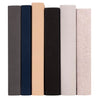 Add a touch of subtle sophistication to any shelf. Juniper Custom's fabric-wrapped books effortlessly add warmth, texture, and a purposefully uniform look to any space. They are hand-wrapped in premium bookbinding fabric and available in various classic, neutral shades.