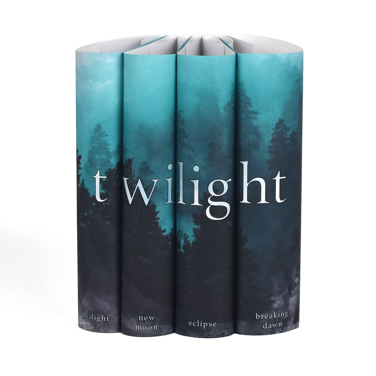 Twilight Saga Jackets only from Juniper Custom. Twilight typed across spines in white serif font set against a blue and gray watercolor style foggy pine forest. Book title centered at the bottom of each spine.