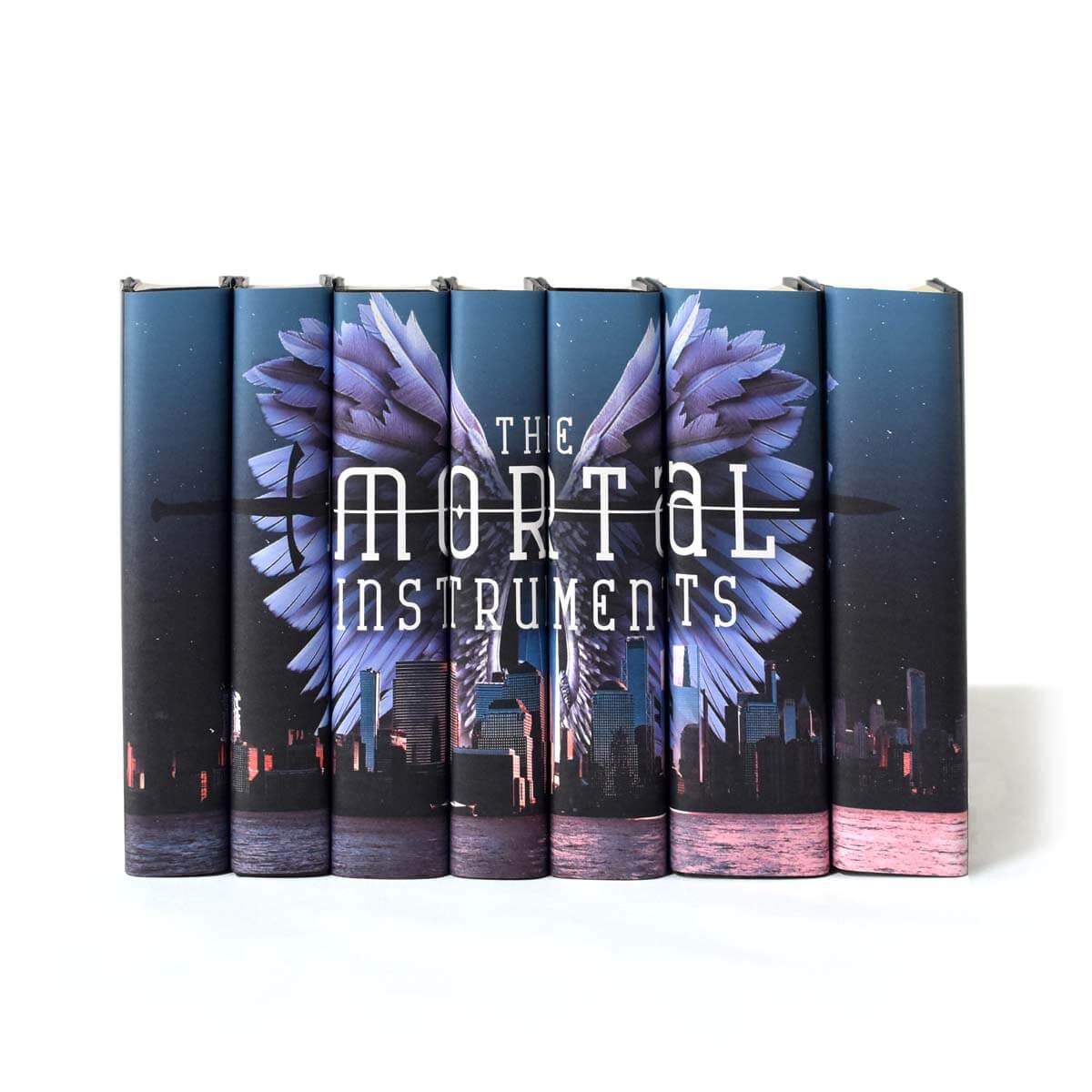 Enjoy the captivating world of demon hunters and angels with The Mortal Instruments, Cassandra Clare's popular fantasy young adult book series. Including custom-printed jackets, our made-to-order set is a great gift for fans of the series.