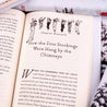 This festive set of novels is the perfect way to celebrate your favorite year-end traditions. Book Set, gift, trade, Christmas shopping. Detail shot of font in books in the Christmas Classic Book Set.