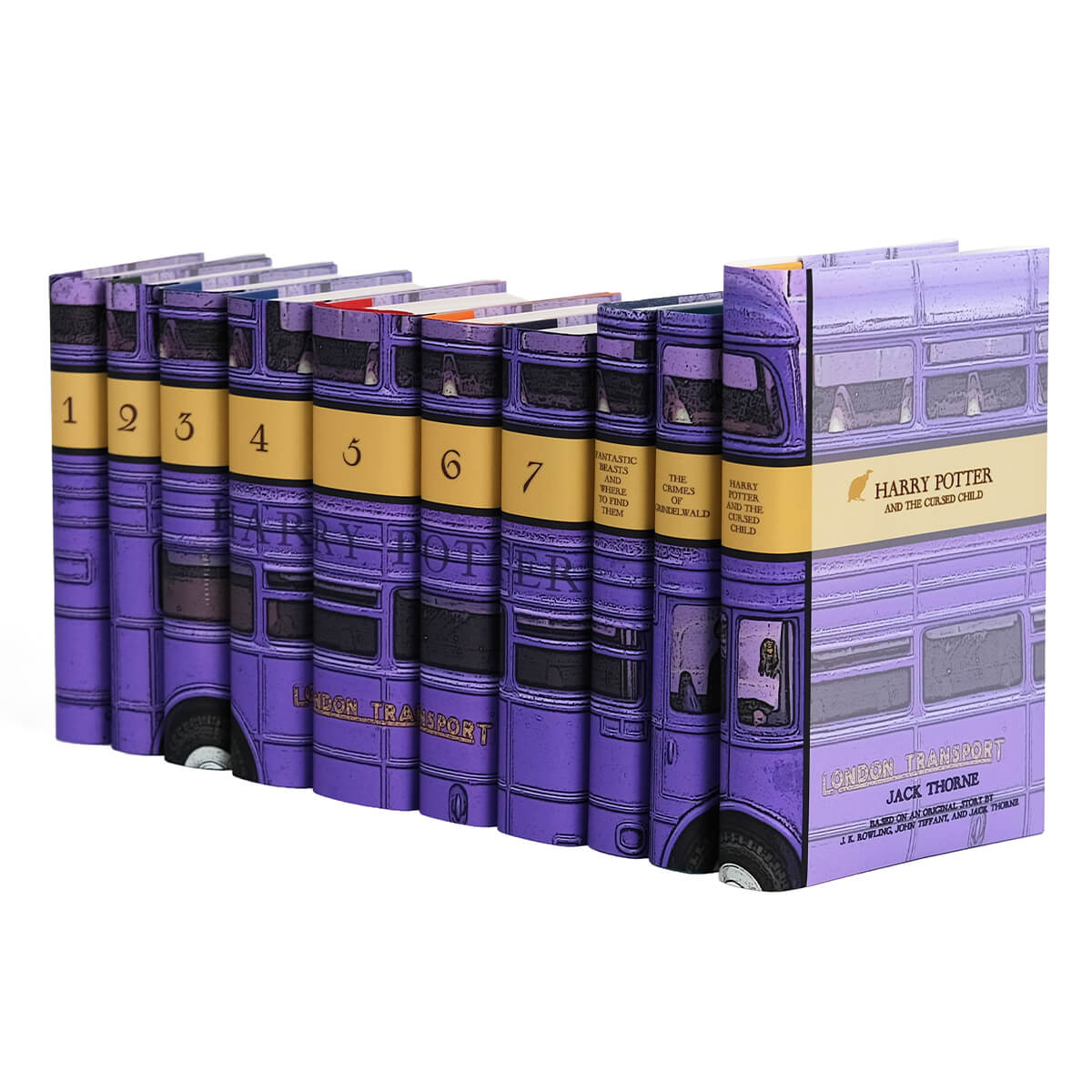Angle shot of UK Harry Potter Bus set. Spines form a purple London Bus and numbered spines. Front cover features book titles and author along with a symbol from each book.
