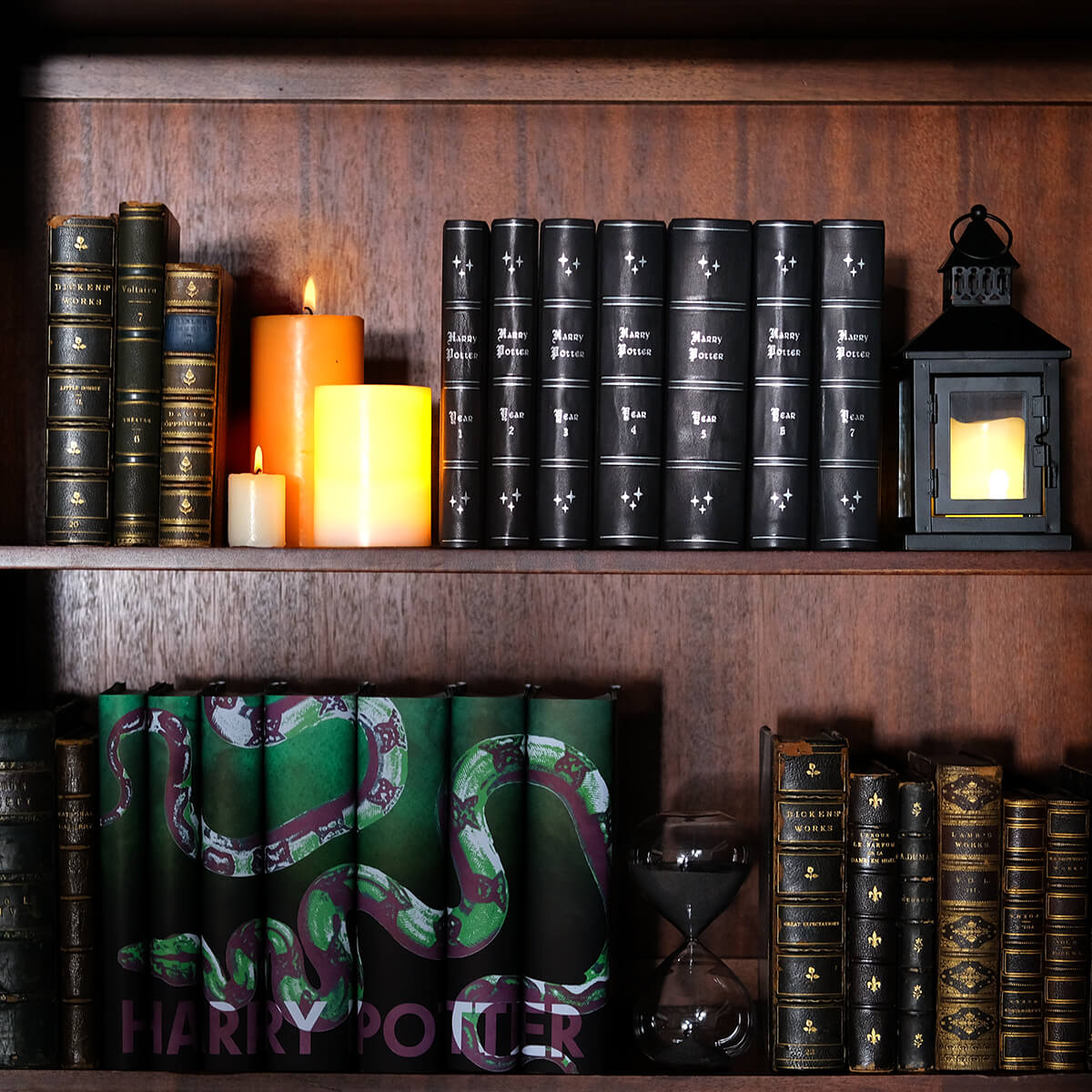 Genuine black leather Harry Potter from Juniper Books with silver book titles, silver ornaments, and silver stars on the spines.