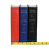 Unjacketed photo of three books in Crescent City Series by Sarah J. Maas. Books are red, blue, and black with gold type down the spine detailing author name and book title. Tape Measure rests against bottom displaying width of set.