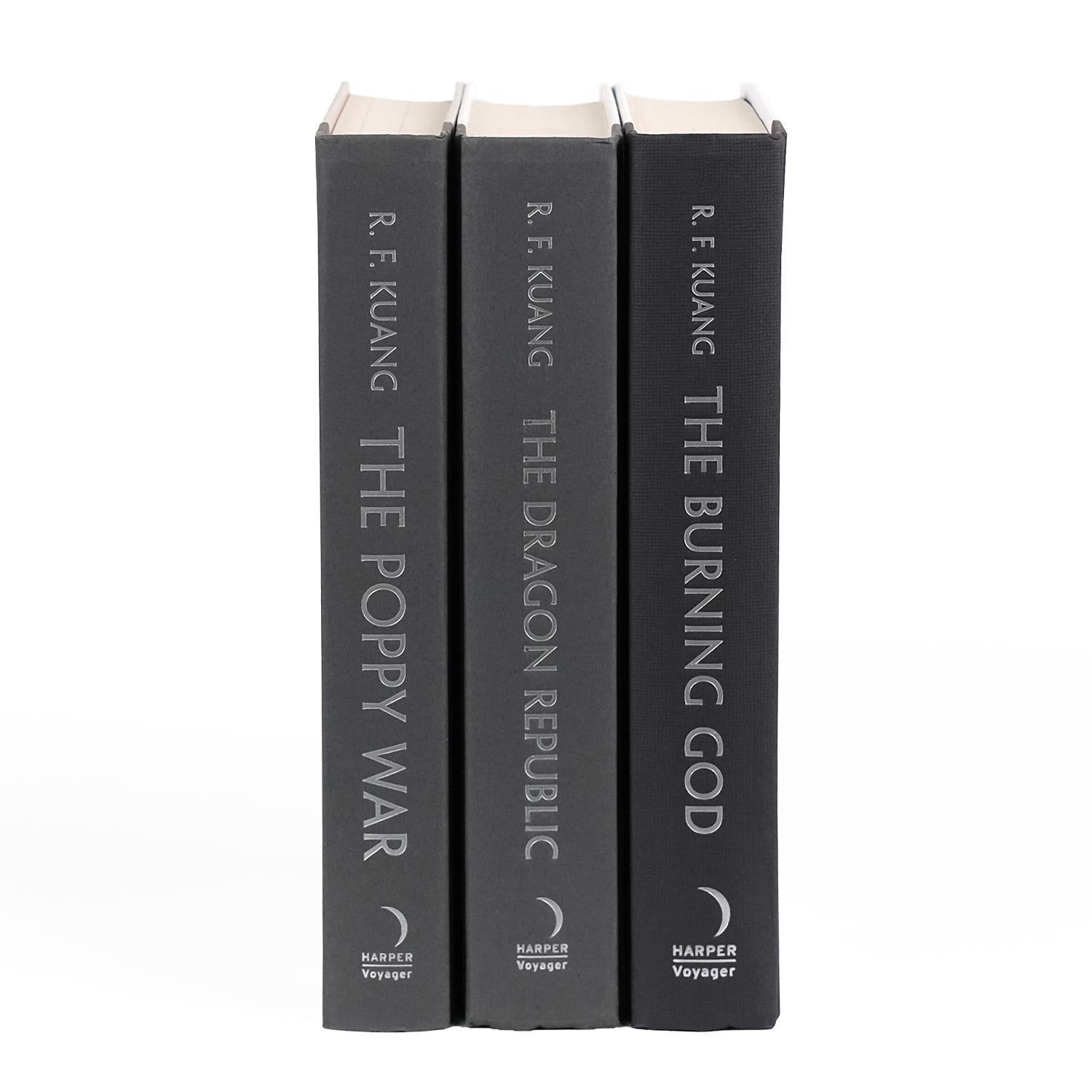 The unjacketed spines of three books by R.F. Kuang from The Poppy War series. The titles, The Poppy War, The Dragon Republic, and The Burning God, are printed in silver lettering on plain black covers with the Harper Voyager logo at the bottom of each spine.