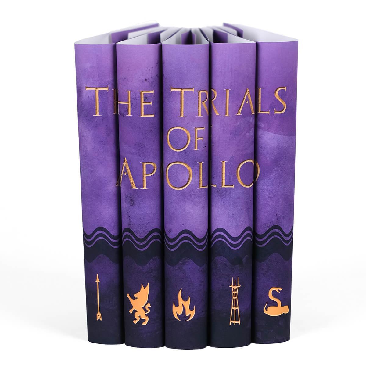 Purple custom collectible dust jackets from Juniper Books for The Trials of Apollo books.